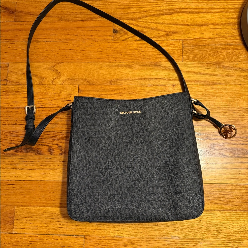 Michael Kors Black Messenger Bag with Monogram Pattern